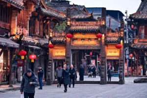 Jiezi Ancient Town in Chengdu with traditional Sichuan architecture, red lanterns and an old stone archway